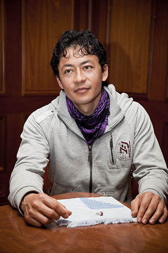 Hedayat Osyan with his Hazara embroidered handkerchief, 2012. Photographer Andrew Frolows/ANMM.