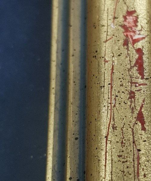 Photograph showing the damage and loss of gilding on the frame of the Joseph Banks cameo