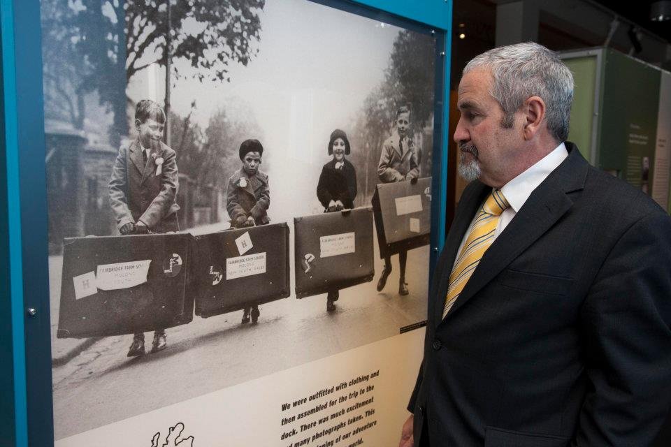 Hugh McGowan views the On their own exhibition, 2011. Courtesy Museums Victoria